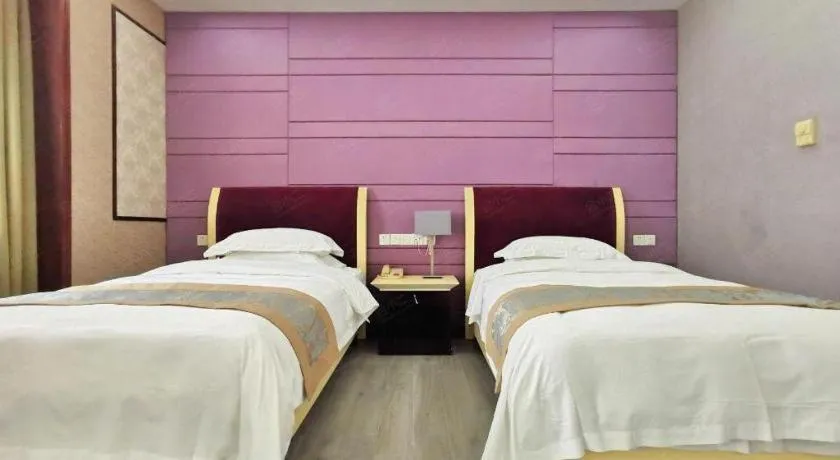 Bed in Hua Xia Pearl Hotel