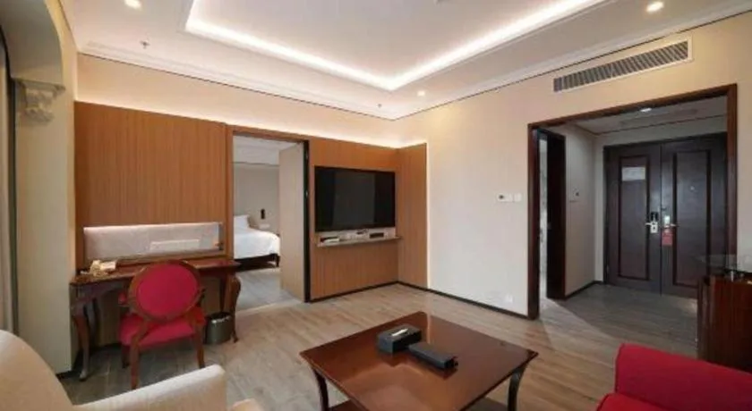 Bed in Hua Xia Pearl Hotel