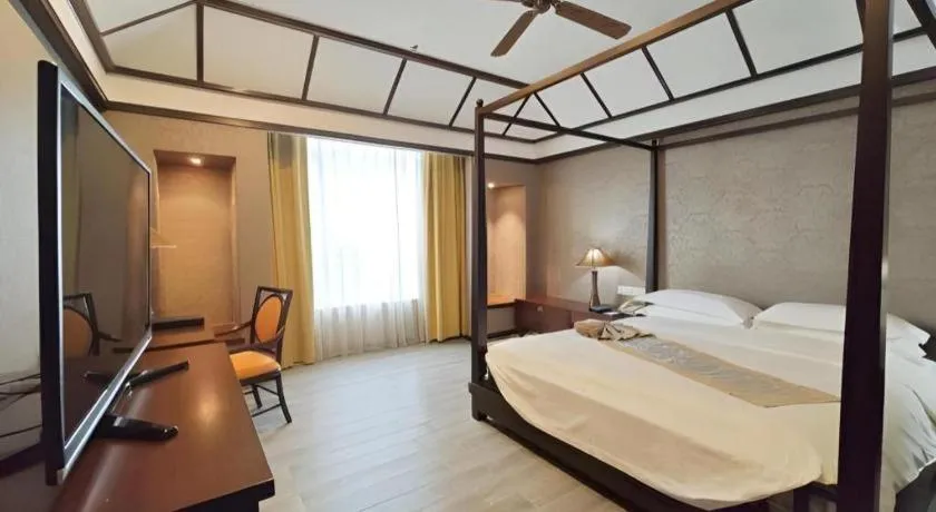 Bed in Hua Xia Pearl Hotel