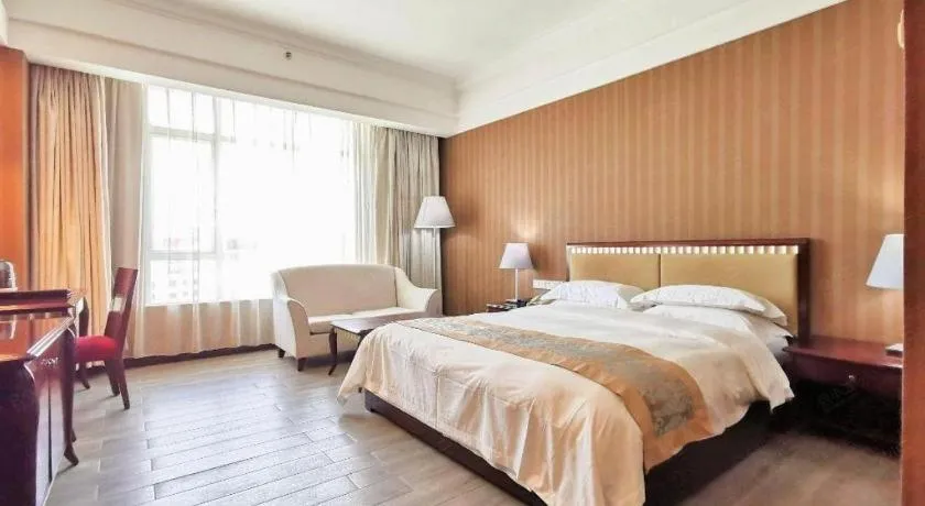 Bed in Hua Xia Pearl Hotel