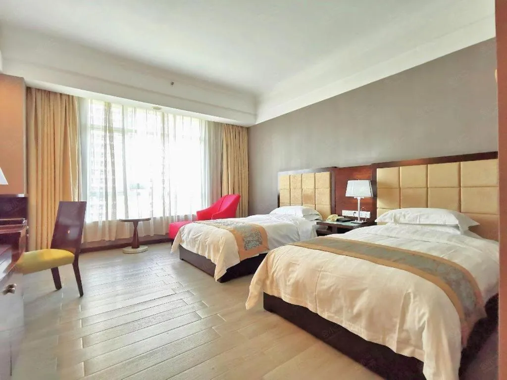 Bed in Hua Xia Pearl Hotel