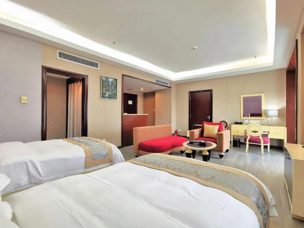 Bed in Hua Xia Pearl Hotel