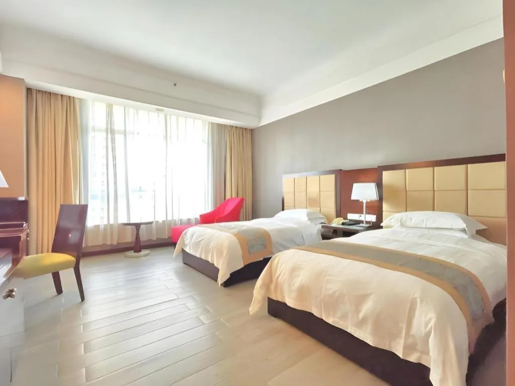 Bed in Hua Xia Pearl Hotel