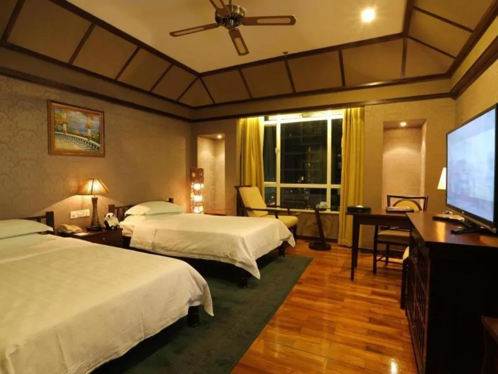 Bed in Hua Xia Pearl Hotel