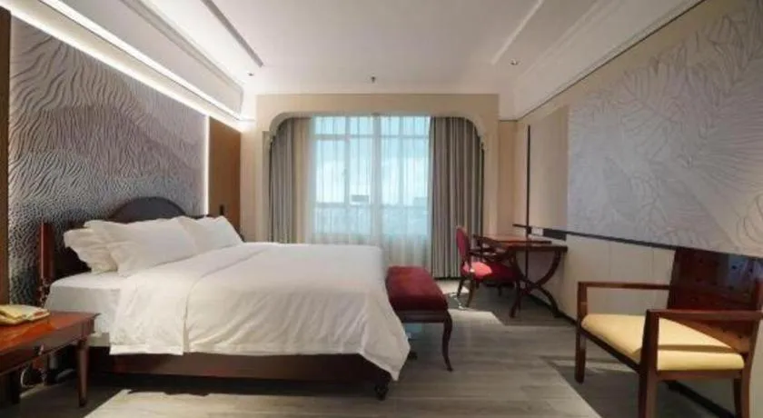 Bed in Hua Xia Pearl Hotel