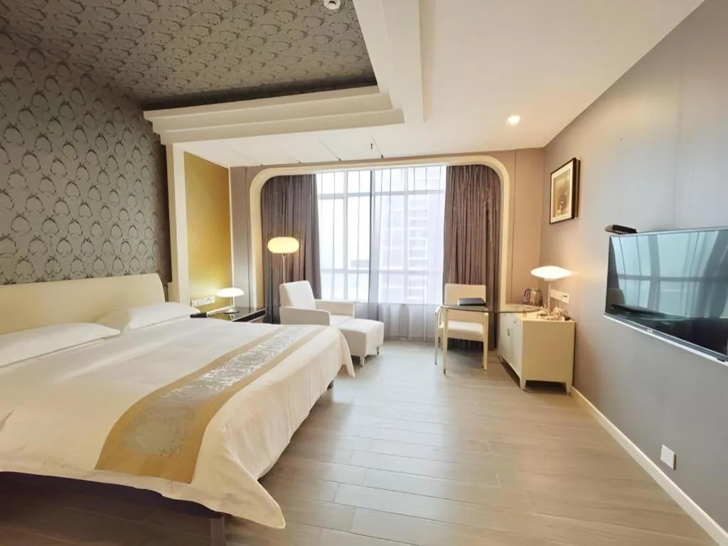 Bed in Hua Xia Pearl Hotel