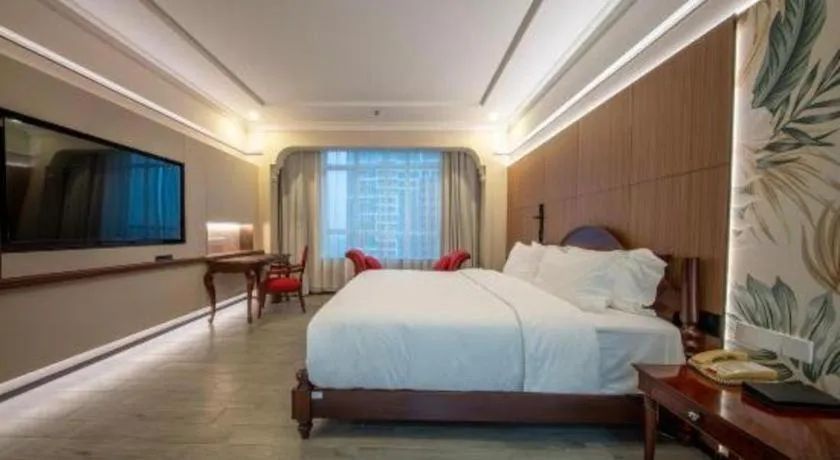Bed in Hua Xia Pearl Hotel