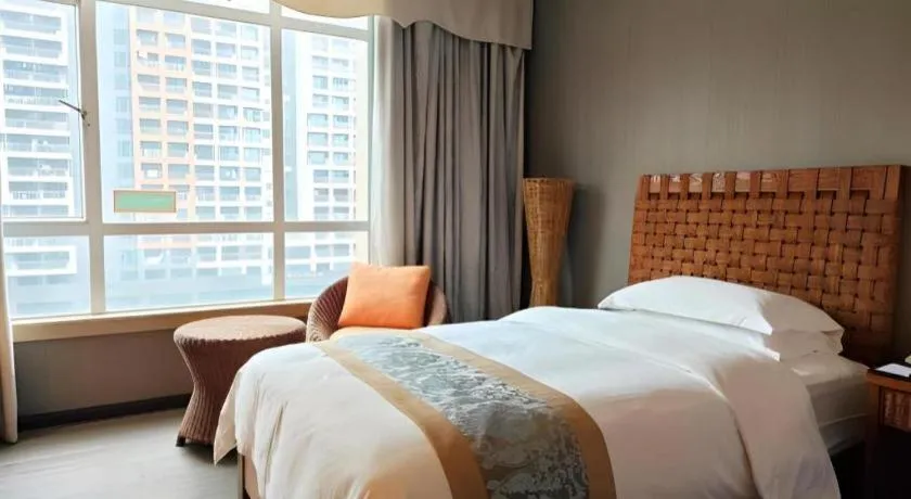 Bed in Hua Xia Pearl Hotel