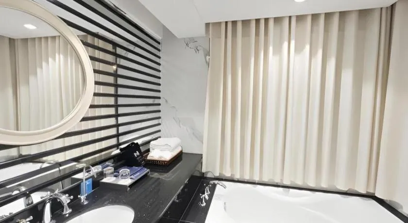 Bed in Hua Xia Pearl Hotel