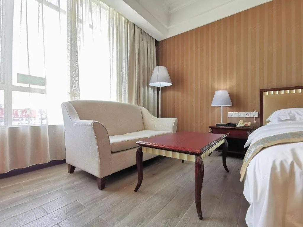 Bed in Hua Xia Pearl Hotel