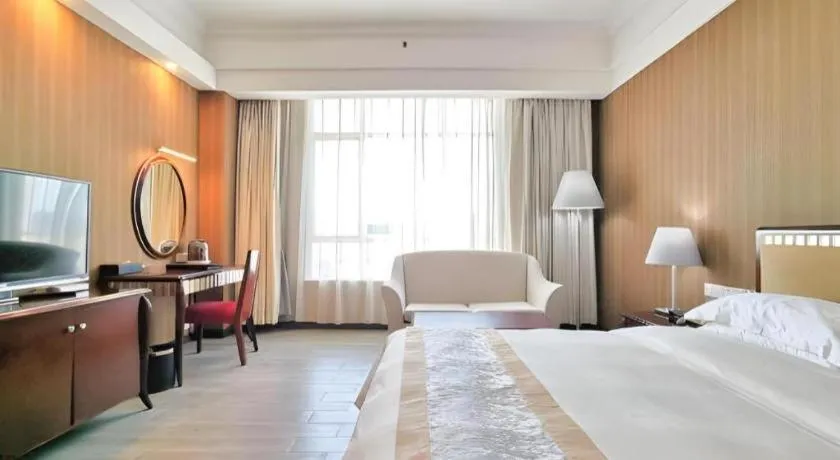 Bed in Hua Xia Pearl Hotel