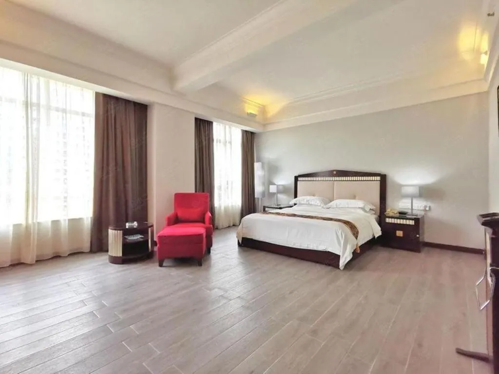 Bed in Hua Xia Pearl Hotel