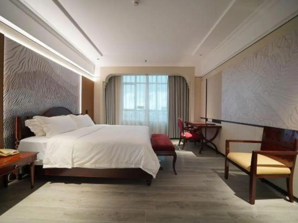 Bed in Hua Xia Pearl Hotel