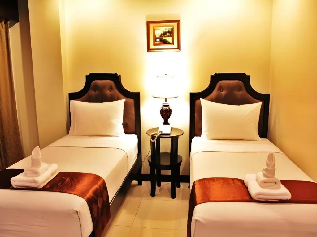 Bed in Peridot Suites