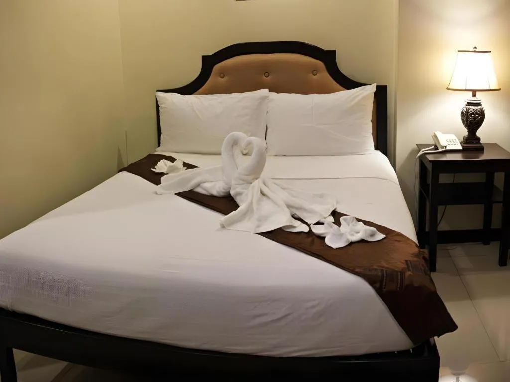 Bed in Peridot Suites