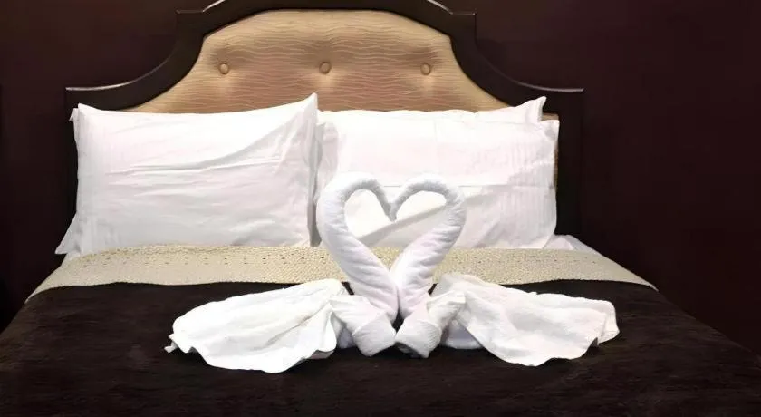 Bed in Peridot Suites