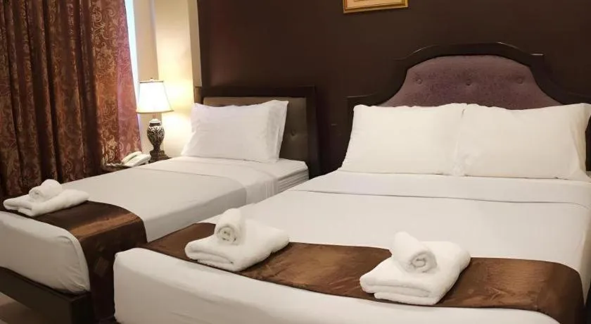 Bed in Peridot Suites
