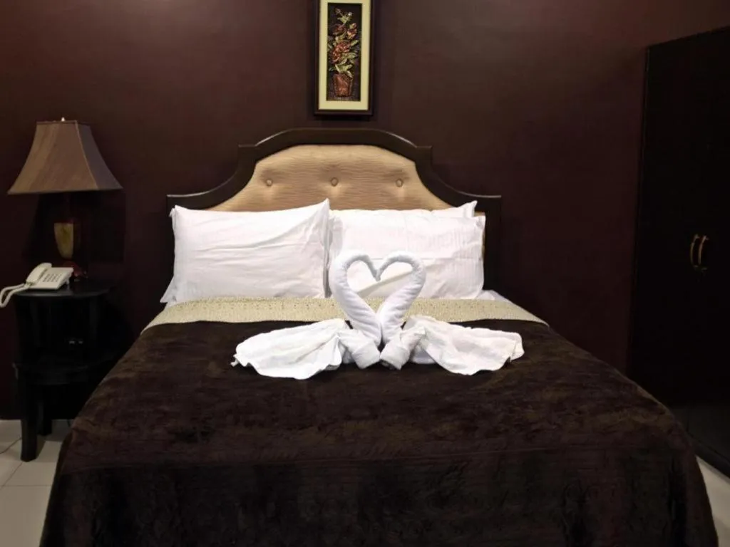 Bed in Peridot Suites