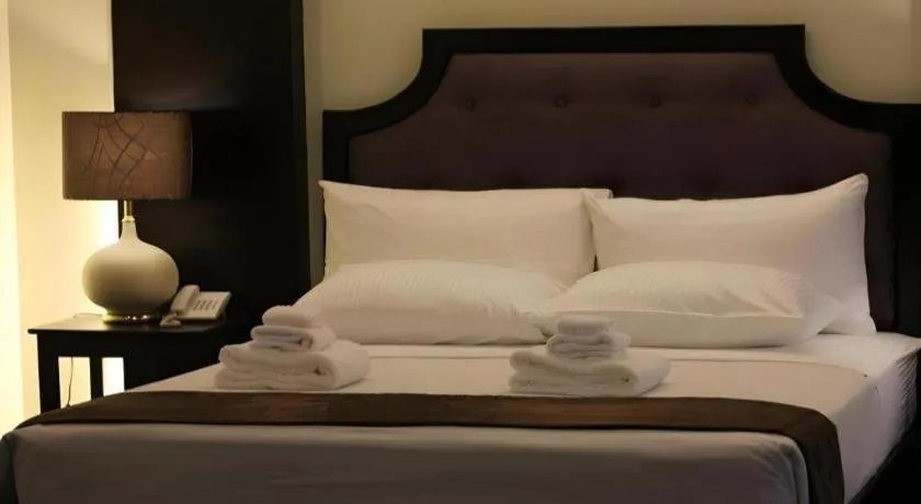 Bed in Peridot Suites