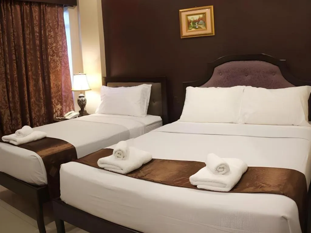 Bed in Peridot Suites