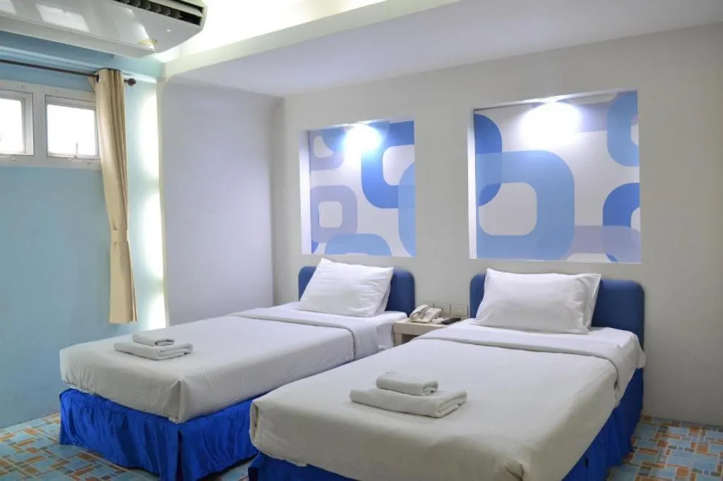 Bed in Bangsaen Villa Hotel