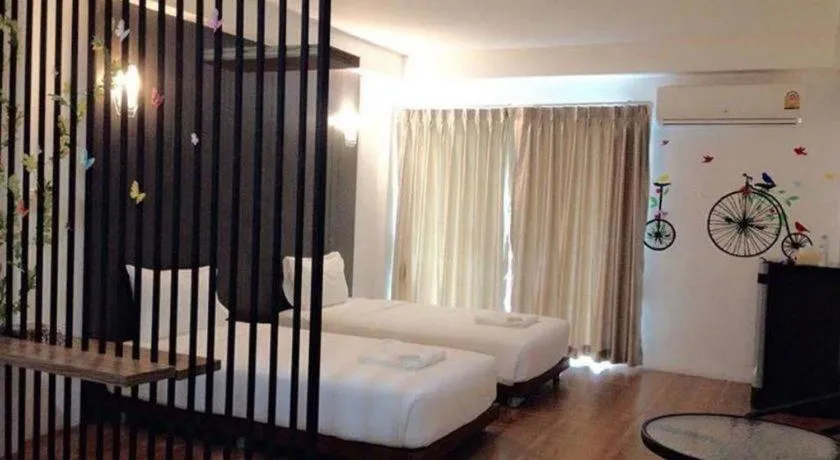 Bed in The Pride Hotel At Laemsing