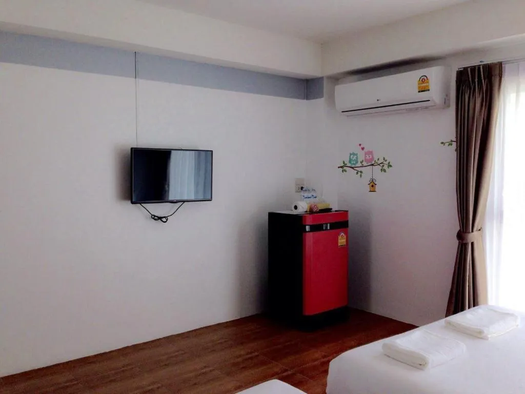 Bed in The Pride Hotel At Laemsing