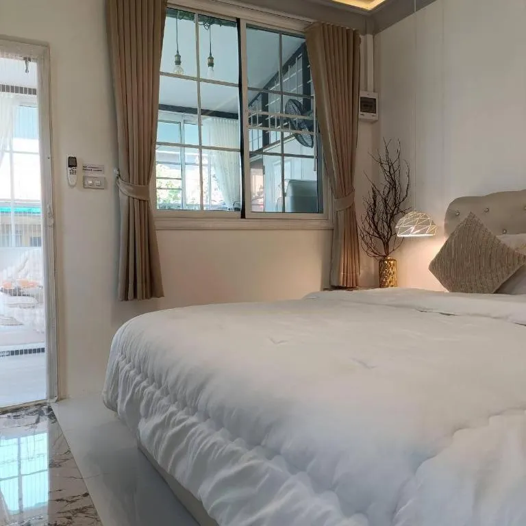 Bed in Palm Sweet Hotel