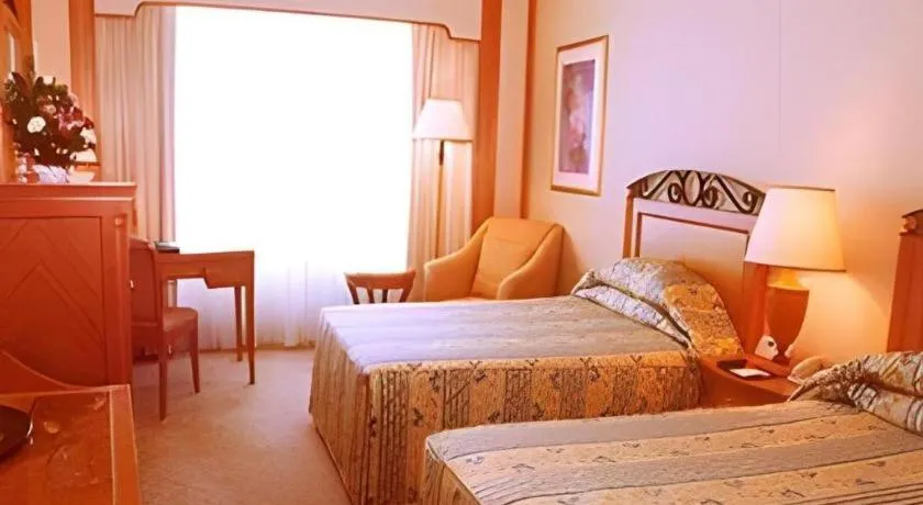 Bed in Regency Hotel