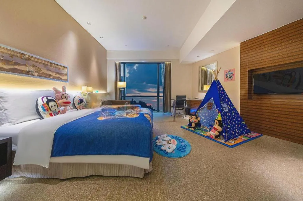 Bed in New World Guiyang Hotel