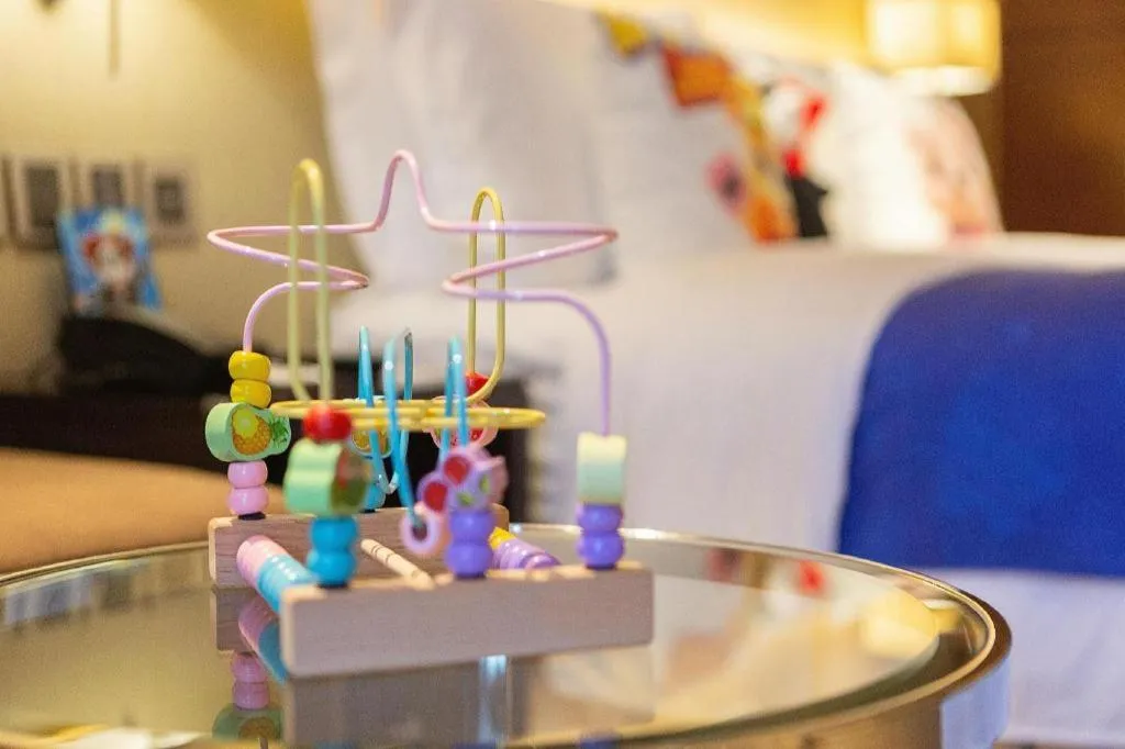 Bed in New World Guiyang Hotel