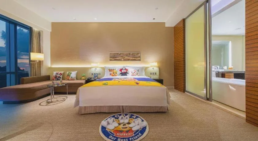 Bed in New World Guiyang Hotel