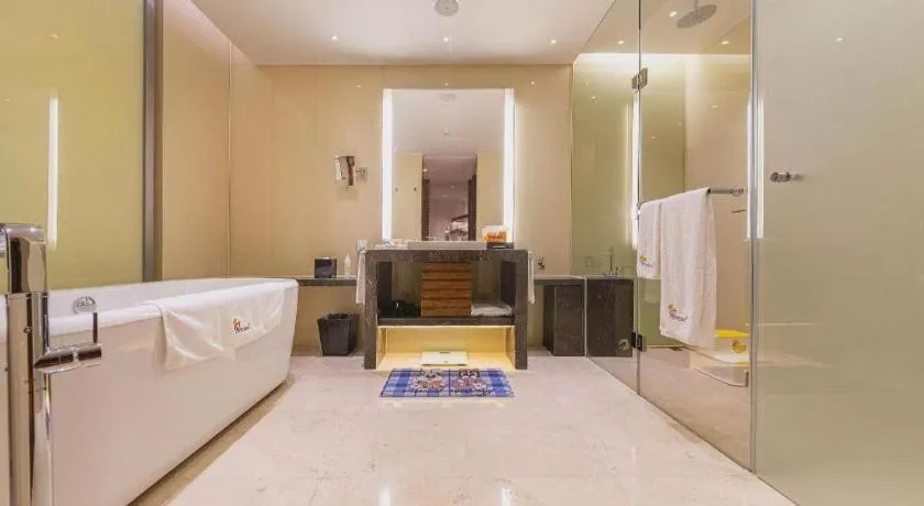 Bed in New World Guiyang Hotel