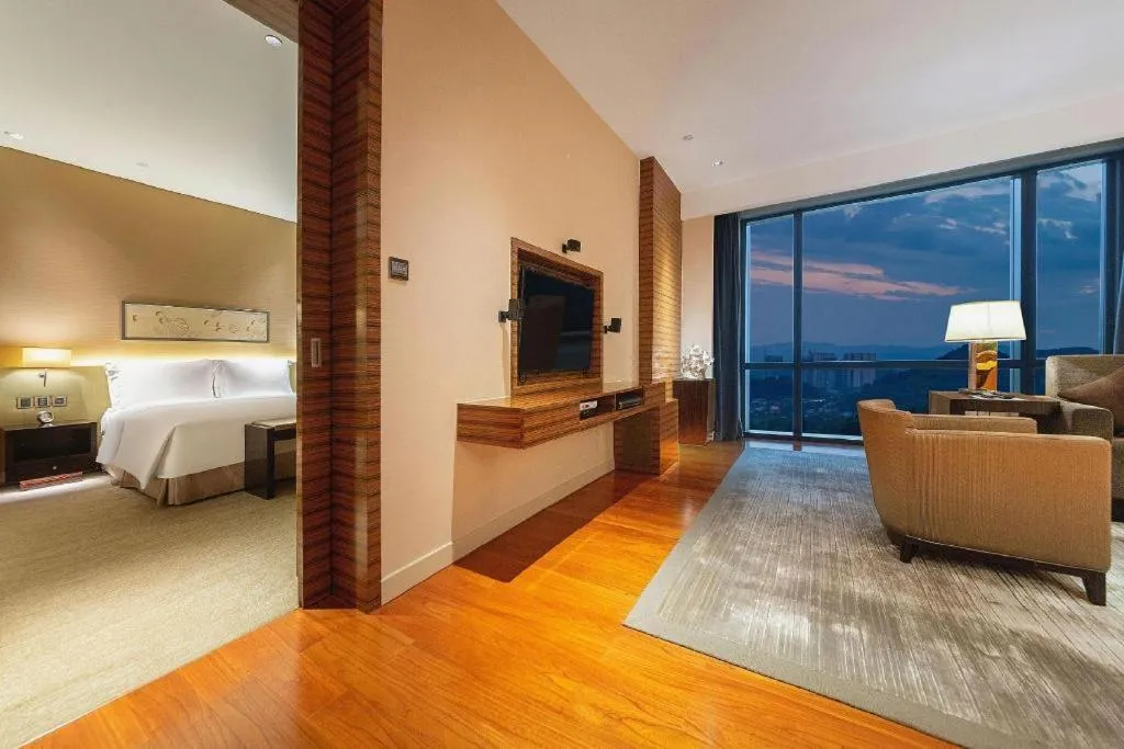 Bed in New World Guiyang Hotel