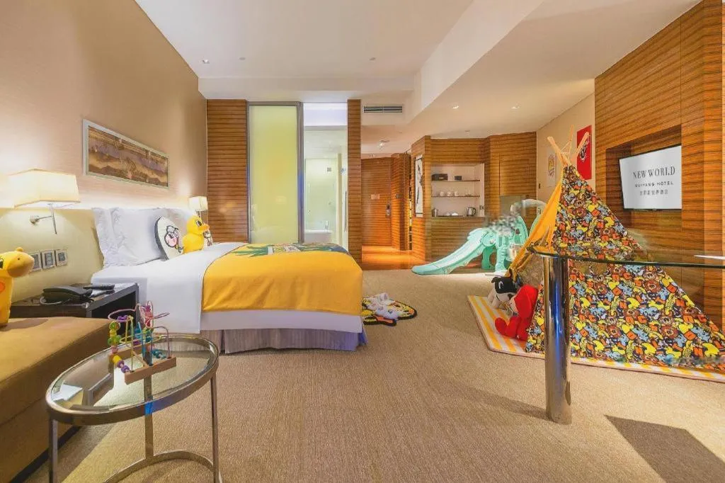 Bed in New World Guiyang Hotel