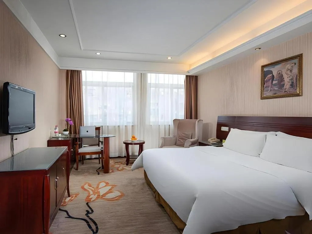 Bed in Vienna Hotel Hangzhou Binkang Road Metro Station