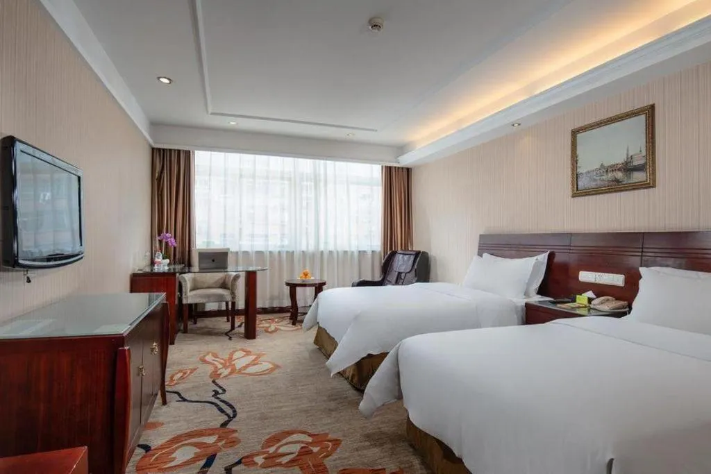 Bed in Vienna Hotel Hangzhou Binkang Road Metro Station