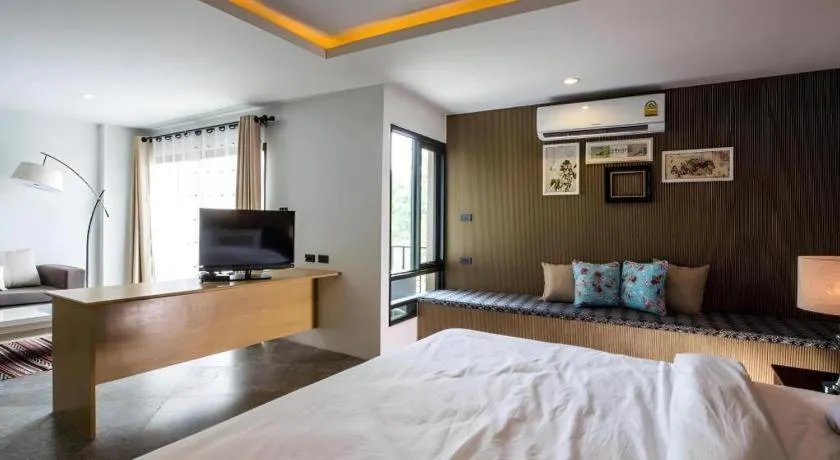 Bed in M Boutique Resort