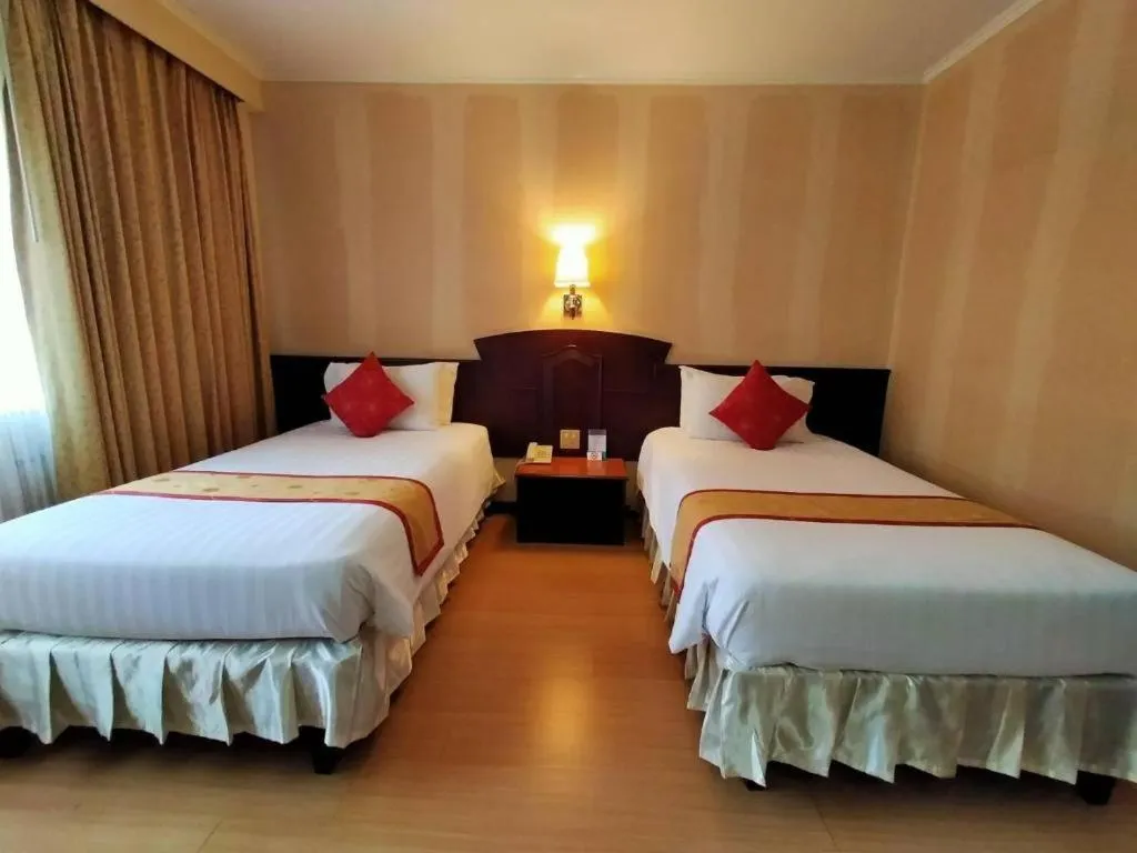 Bed in Grand Vissanu Hotel