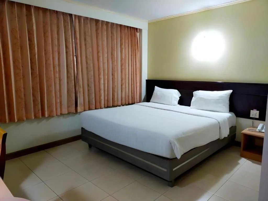 Bed in Grand Vissanu Hotel