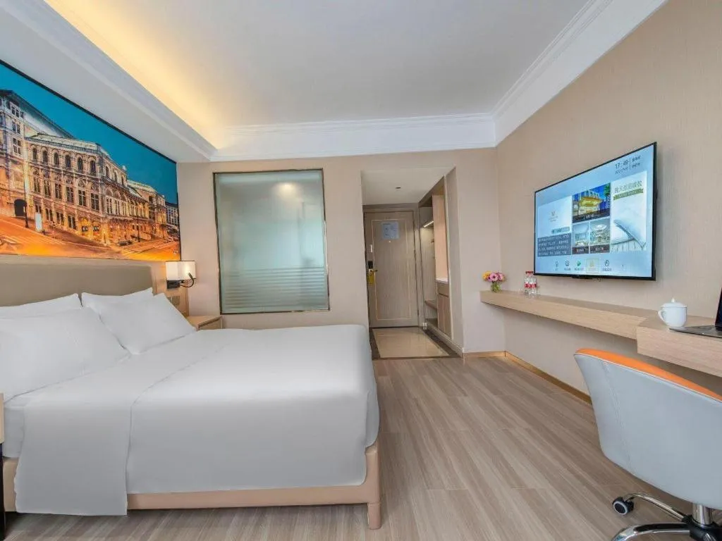 Bed in Vienna Hotel Nanning Train Station