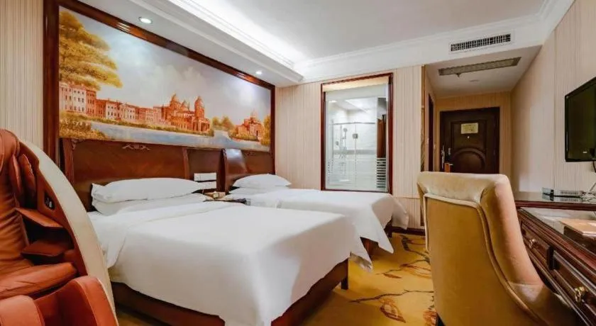 Bed in Vienna Hotel Nanning Train Station