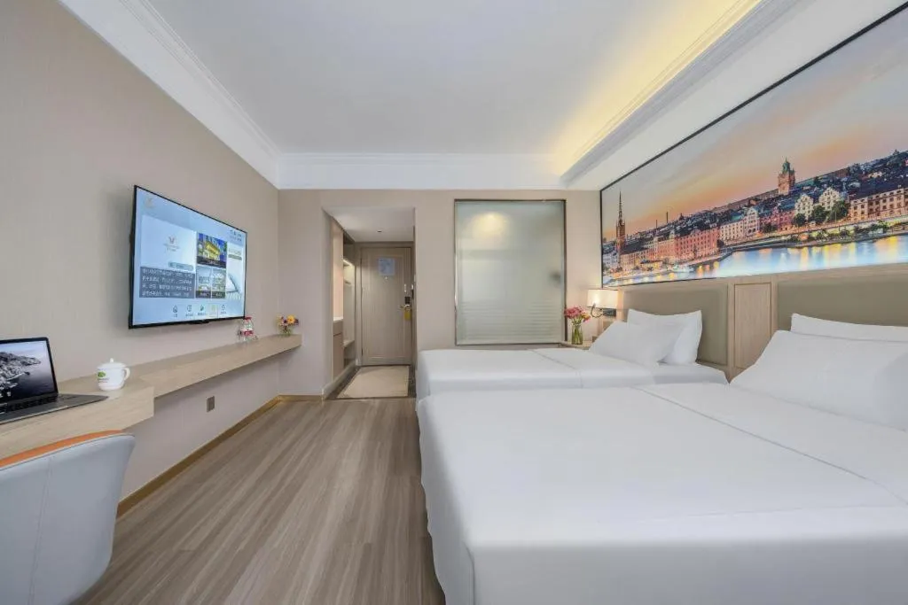 Bed in Vienna Hotel Nanning Train Station