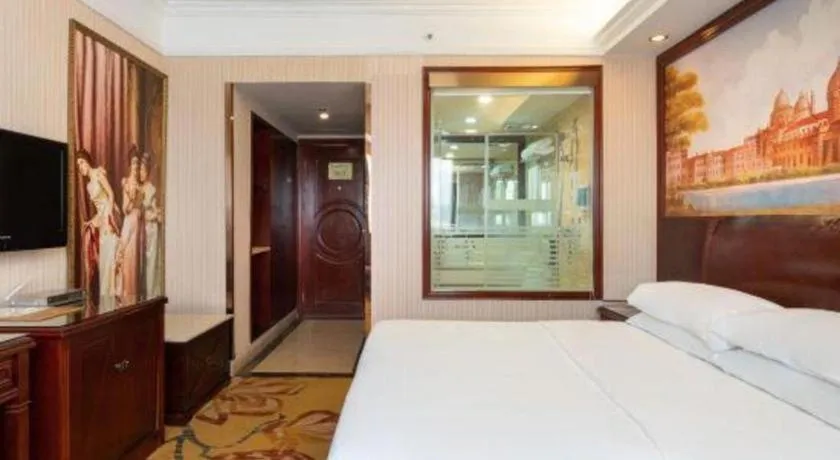 Bed in Vienna Hotel Nanning Train Station