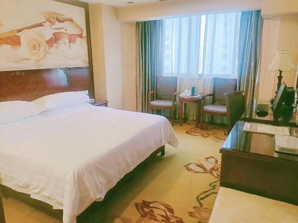 Bed in Vienna Hotel Nanning Train Station