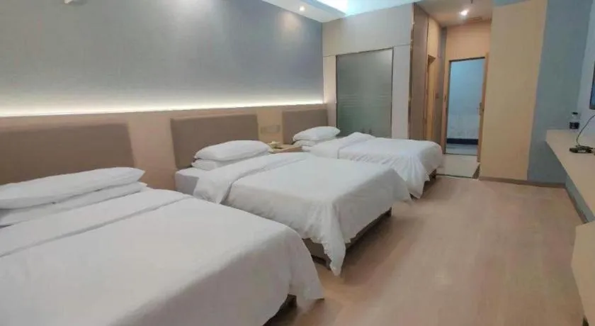 Bed in Vienna Hotel Nanning Train Station