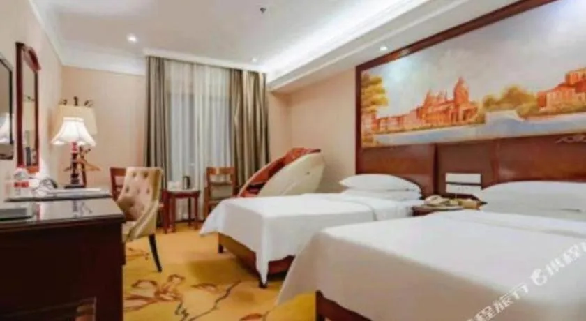 Bed in Vienna Hotel Nanning Train Station