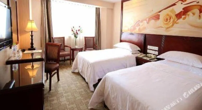 Bed in Vienna Hotel Nanning Train Station