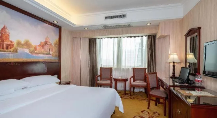 Bed in Vienna Hotel Nanning Train Station