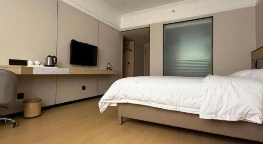 Bed in Vienna Hotel Nanning Train Station